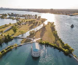 Aerial view of Belle Isle and the Detroit River, part of the Great Lakes Water Authority service area, highlighting regional water infrastructure.